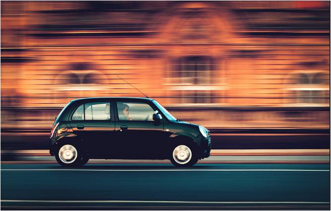discount auto insurance Car Driving Down Road