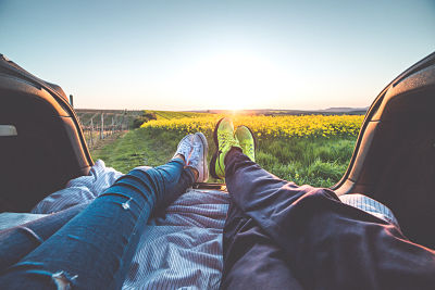 Back of car enjoying sunset